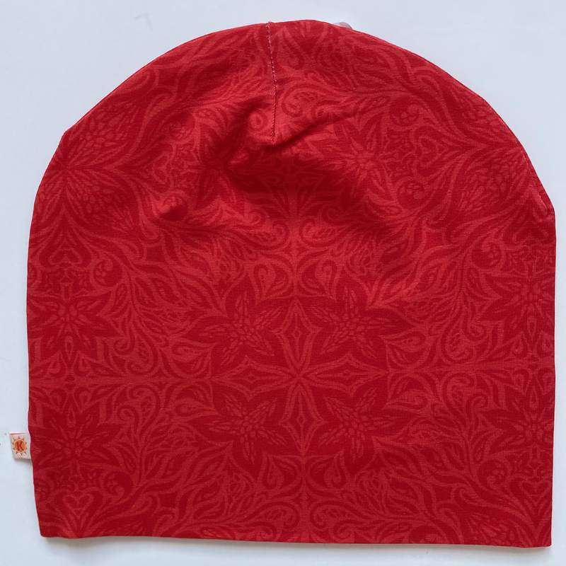 Mössan Toniton röd, fotograferad ovanifrån